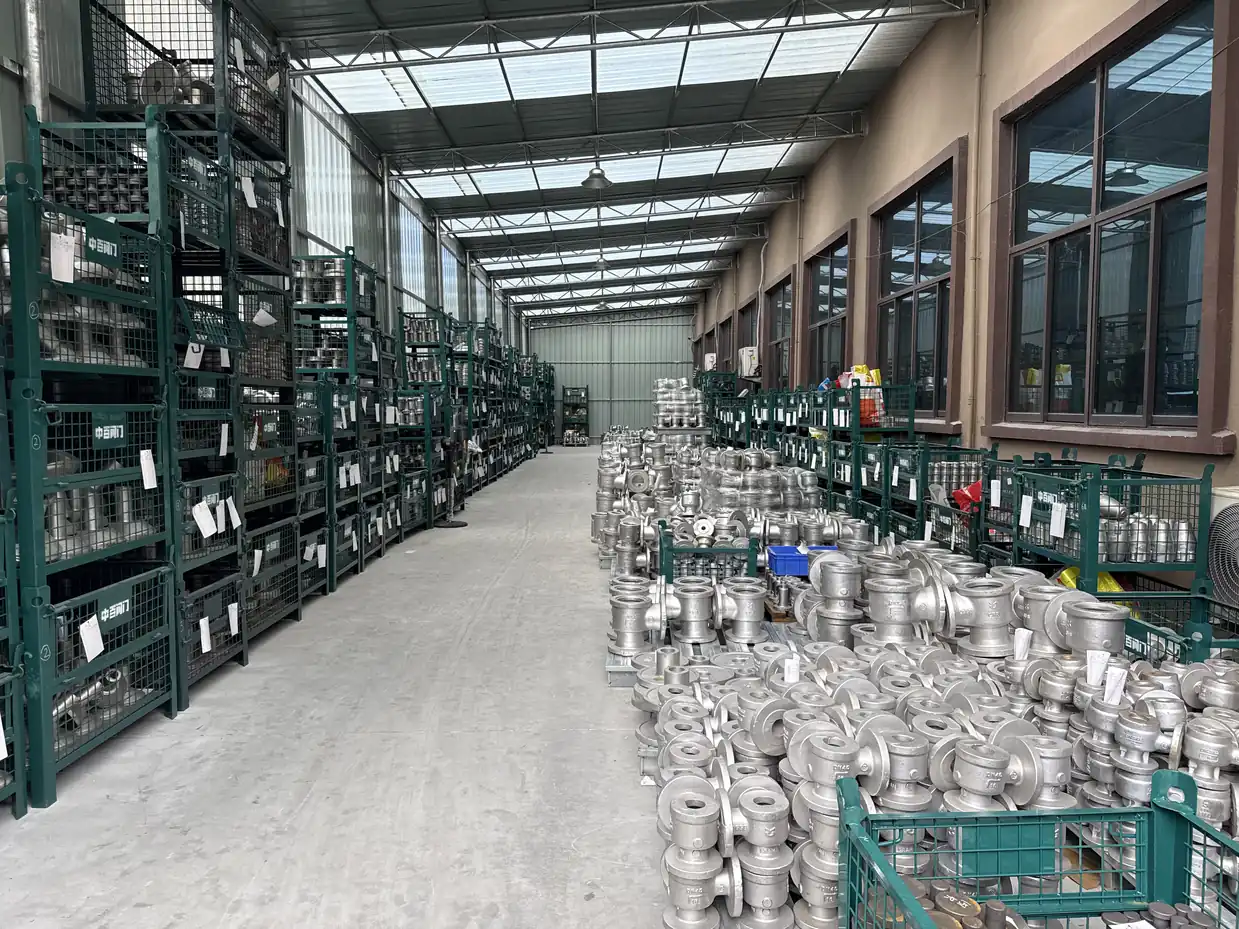 ZOBAI finished valve bodies organized in a covered warehouse