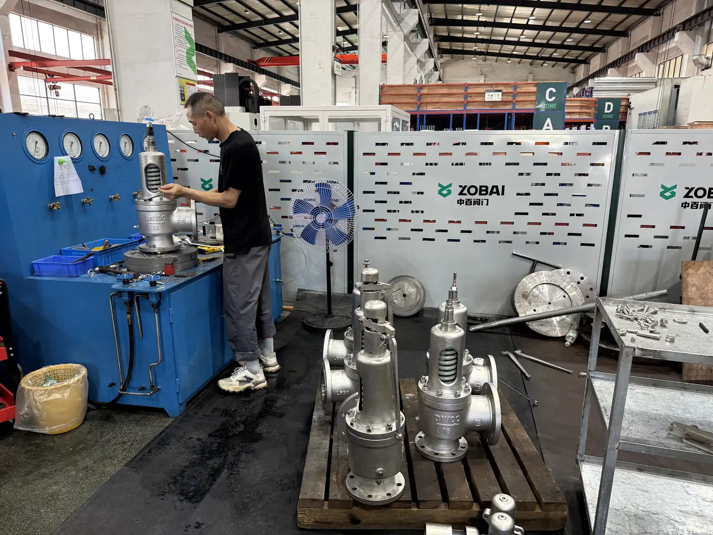 ZOBAI technician pressure-testing a large safety valve
