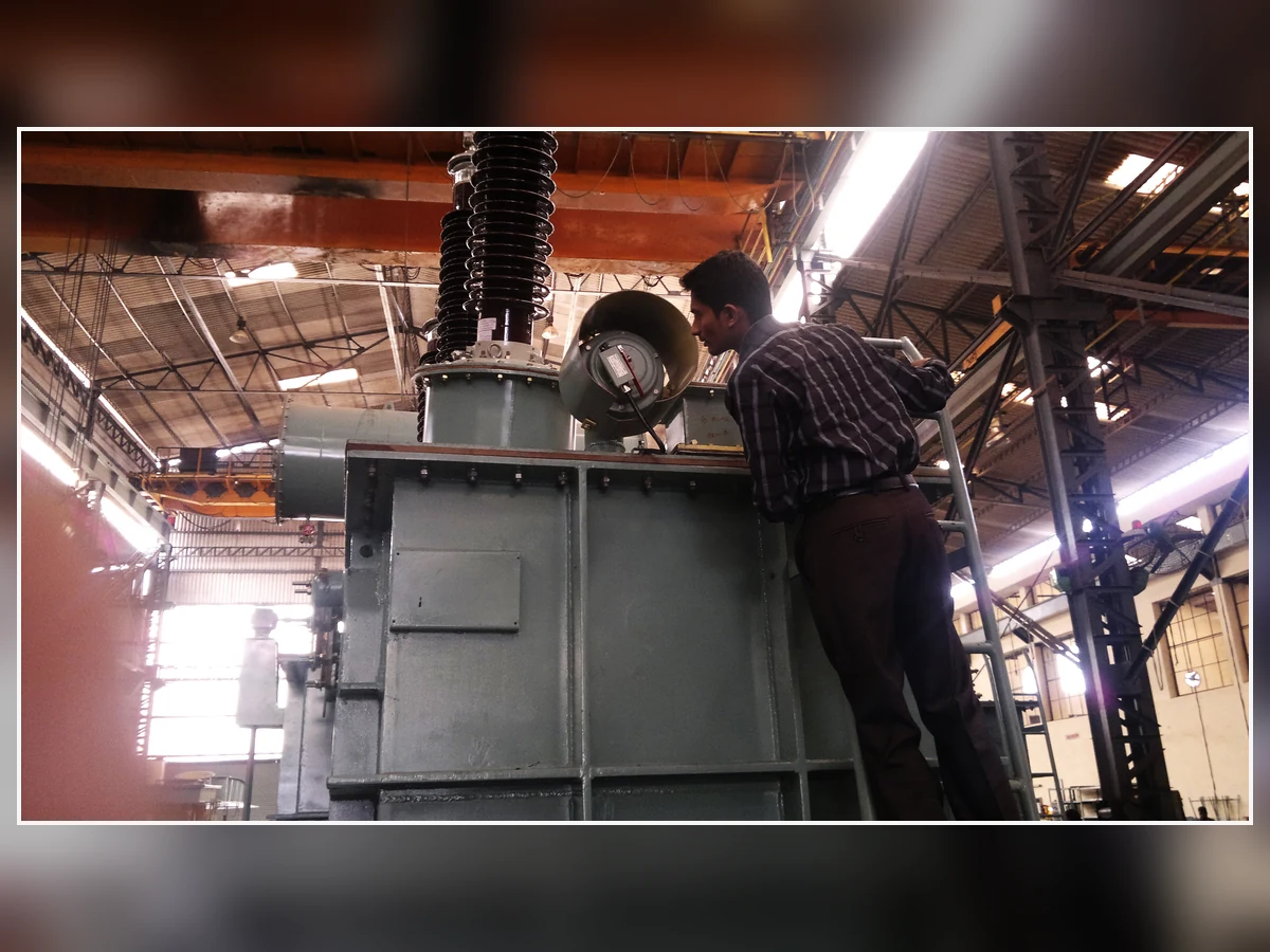 Real Pressure Relief Valve Inspection Engineer inspecting a pressure relief valve on industrial equipment